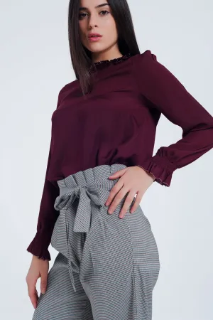 Maroon shirt with neck and sleeve detailed ends